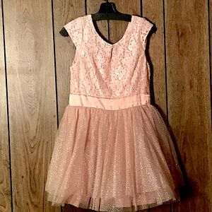 Beautiful peach girls dress, with lace stop and sparkly tutu.